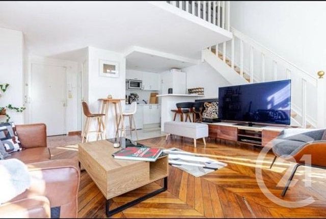 Appartement Duplex à louer - 2 pièces - 44.06 m2 - PARIS - 75008 - ILE-DE-FRANCE - Century 21 Victor Hugo - Trocadéro
